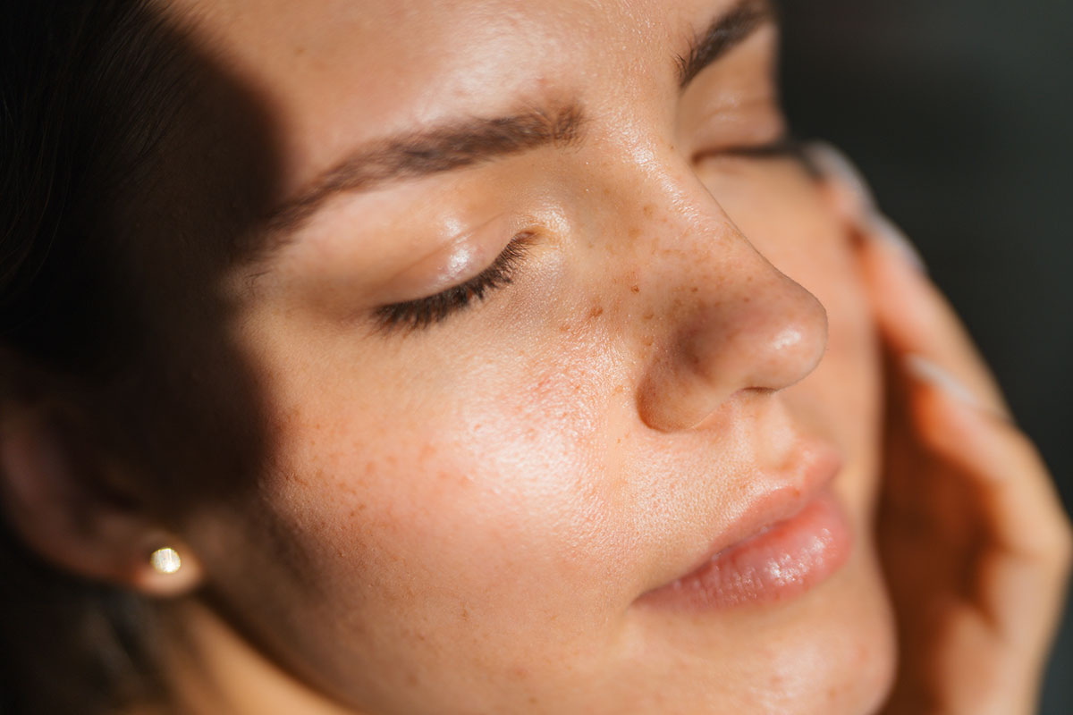 A woman with glowing skin after getting a laser treatment in San Antonio.